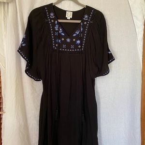 Francesca’s wide-armed black floral dress